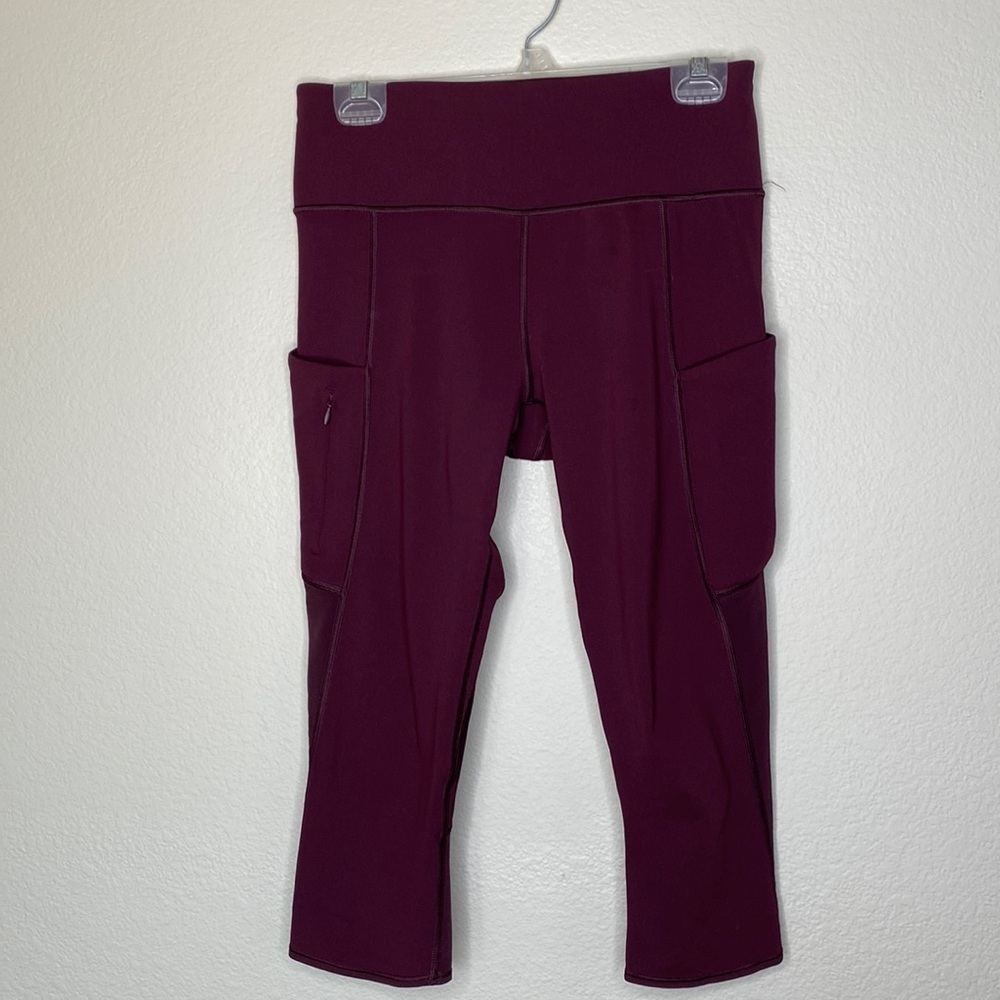 Athleta crop leggings women’s medium pockets plum maroon mesh back